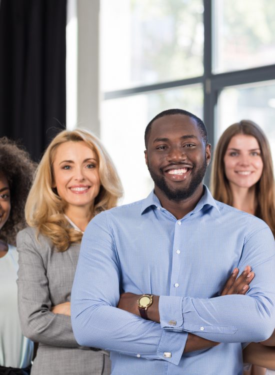 African American Businessman Boss With Group Of Business People In Creative Office, Successful Mix Race Man Leading Businesspeople Team Stand Folded Hands, Professional Staff Happy Smiling